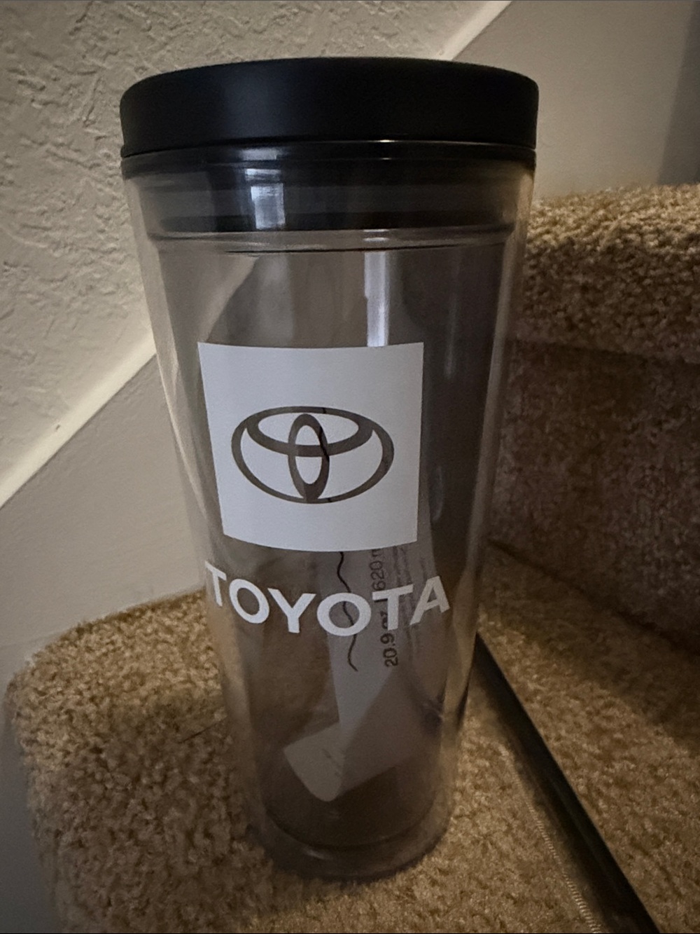 Toyota Branded Clear Travel Tumbler in Smoke with Black Lid.